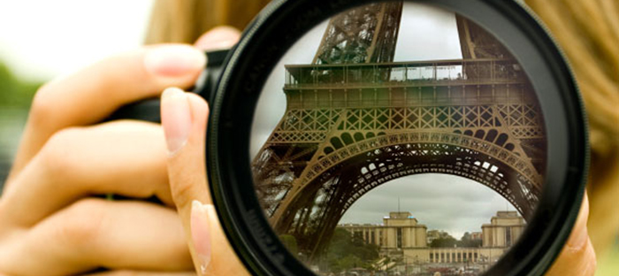 Eiffel tower reflection in camera lenses