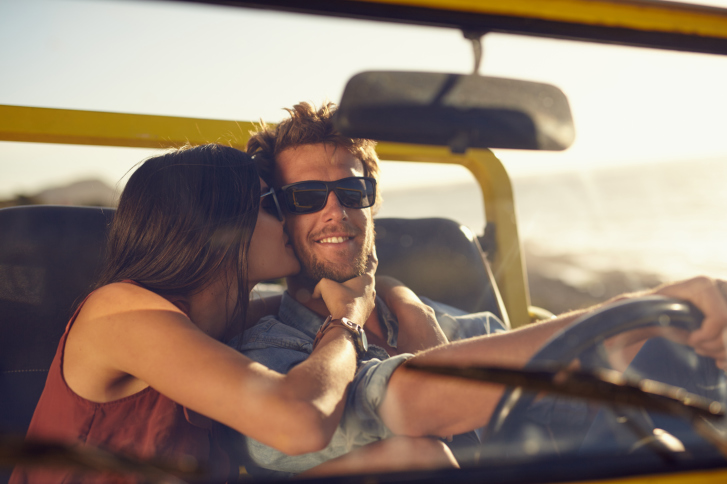 Loving young couple on road trip