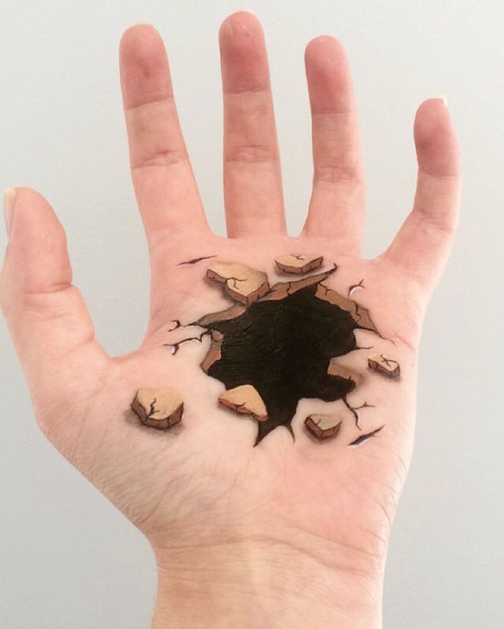 Креативна уметница исцртува надреални оптички илузии на своите раце